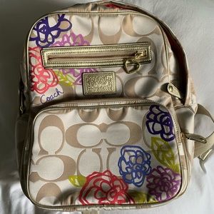 Coach gold poppy daisy backpack